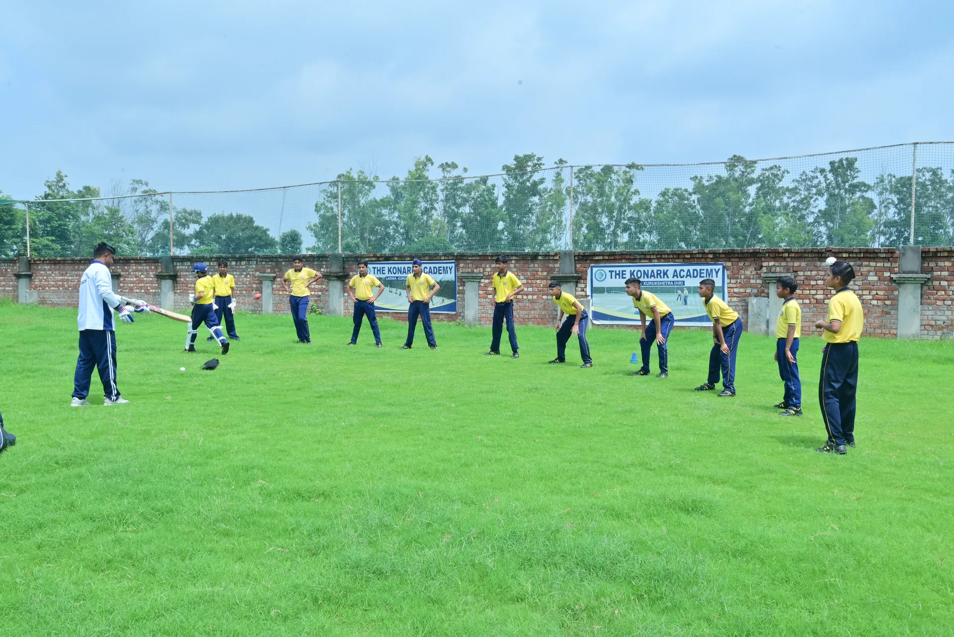 Students practicing cricket at The Konark Academy